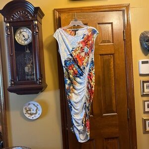 Really cute BCBG Patterned, Floral, Fitted Dress.  Unique side zipper.  Sz. Sm.